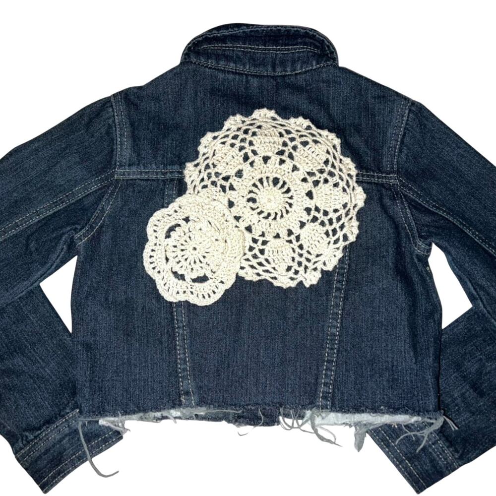 Dark blue denim jean jacket with pretty lace details on back. Size xs girls 6
